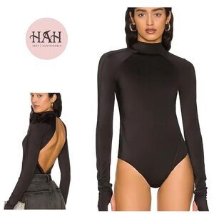 New. We Are HAH black 1-piece swim/bodysuit. Retails $240. Medium